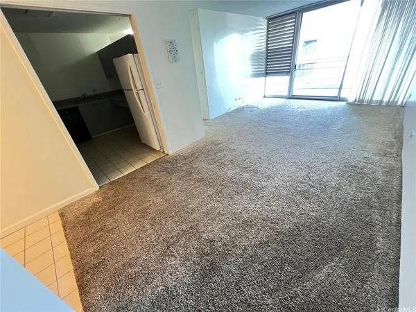 a view of empty room with front door