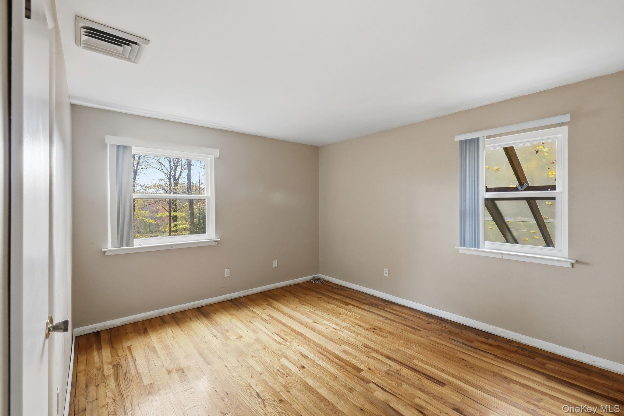 120 S Road Holmes, NY 12531 - Photo 15 of 25 a view of empty room with window and wooden floor