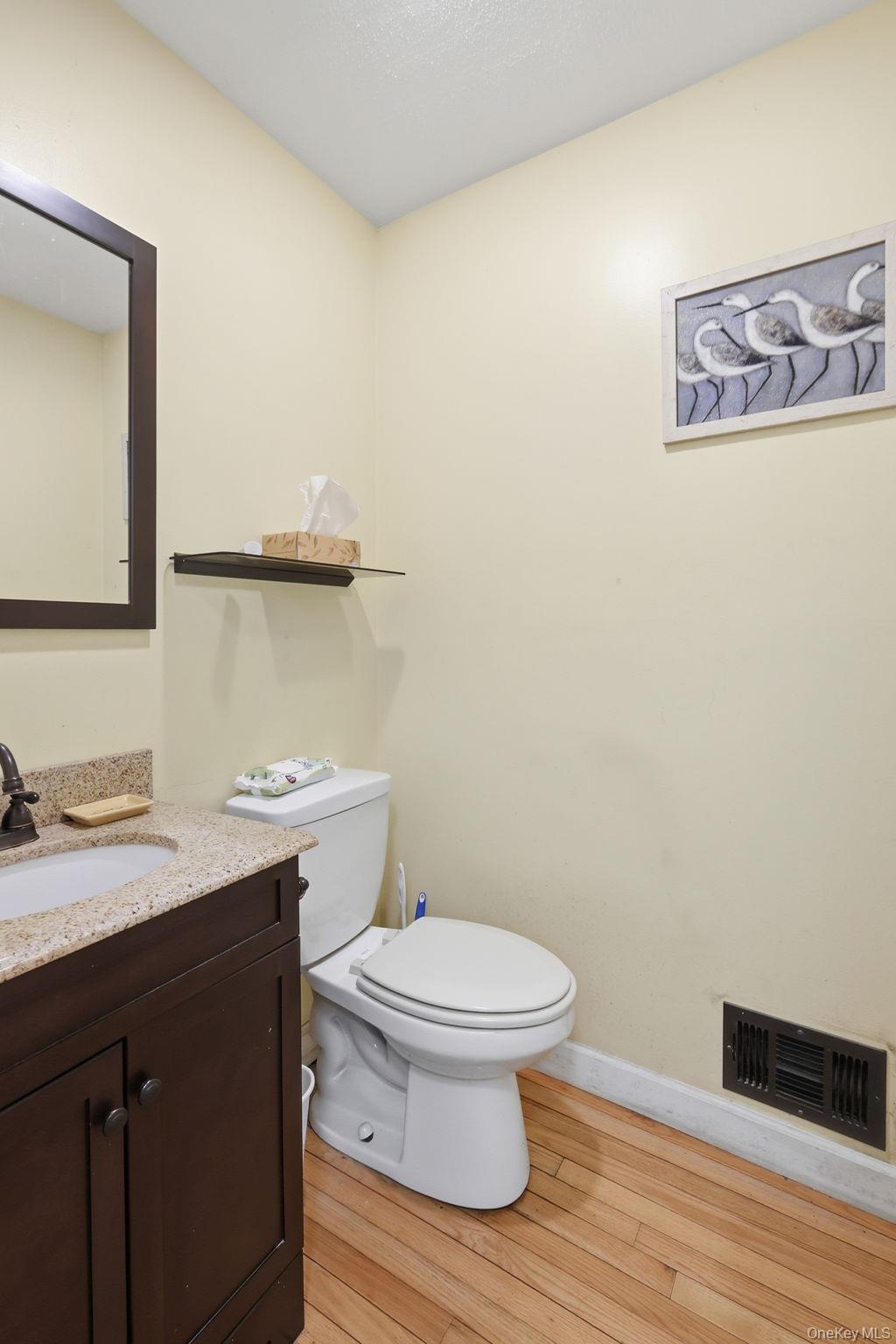 120 S Road Holmes, NY 12531 - Photo 8 of 25 a bathroom with a granite countertop toilet and a sink