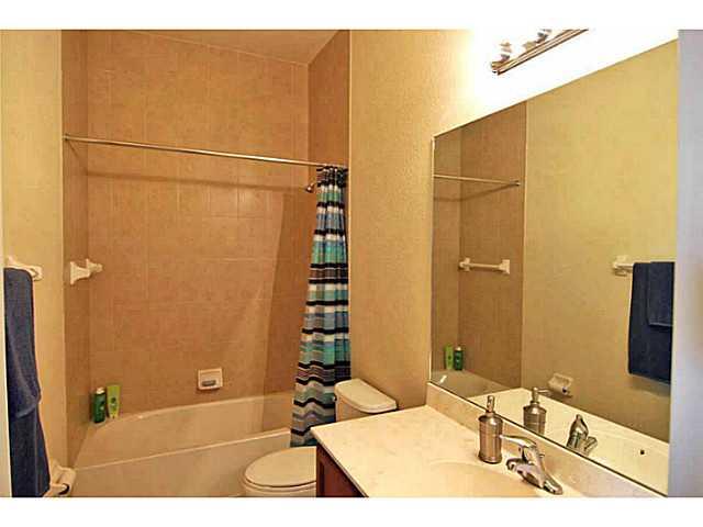 43 Southwest Squirrel Nest Way Stuart, FL 34997 - Photo 16 of 22 a bathroom with a sink and a mirror