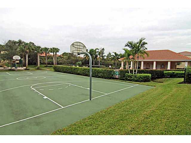 43 Southwest Squirrel Nest Way Stuart, FL 34997 - Photo 22 of 22 a view of a tennis court