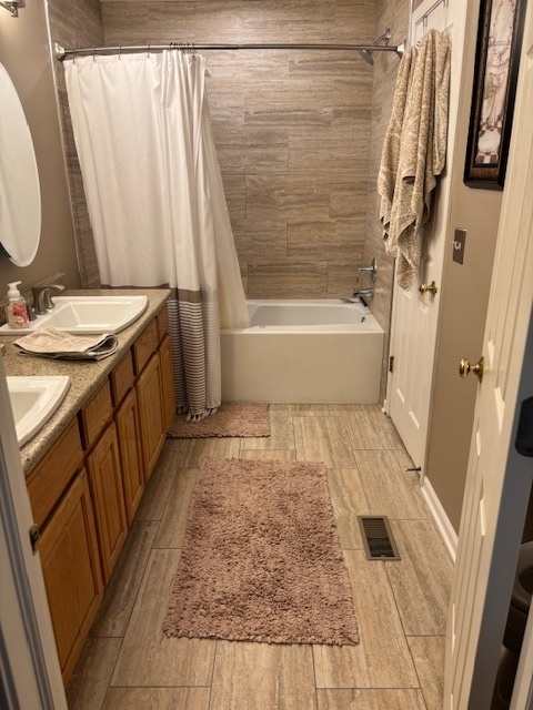 1433 White Pine Lane Bolingbrook, IL 60490 - Photo 18 of 25 a bathroom with a granite countertop sink and a mirror