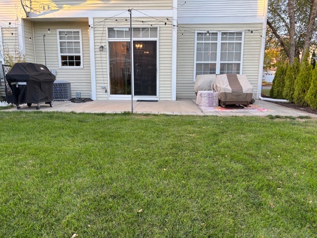 1433 White Pine Lane Bolingbrook, IL 60490 - Photo 25 of 25 a front view of a house with a garden and plants