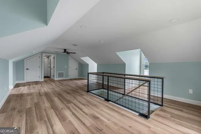 a view of entryway with wooden floor