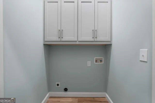 a view of door with washer and dryer