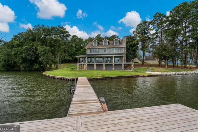 a view of a swimming pool with a lake view