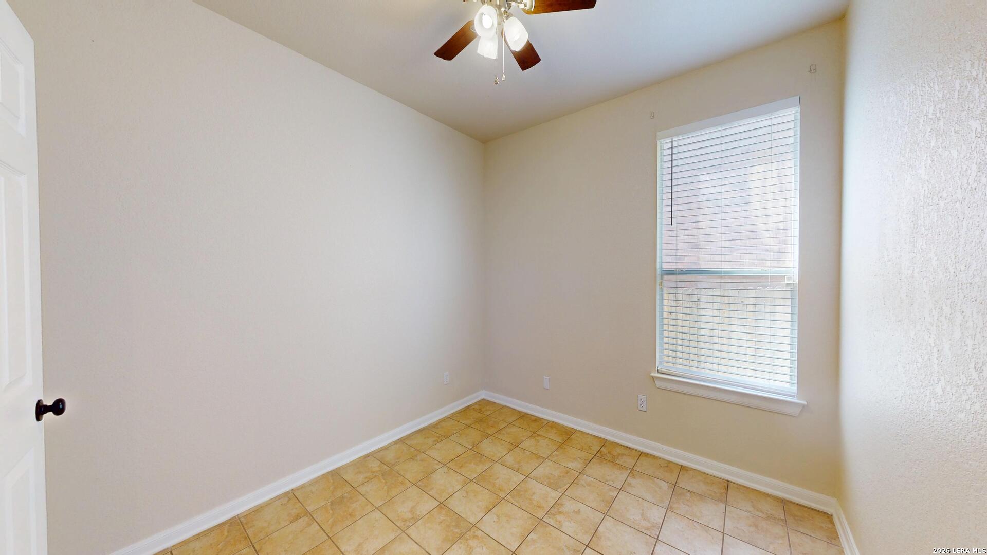 101 Springtree Cliff Cibolo, TX 78108 - Photo 21 of 46 a view of an empty room and a window