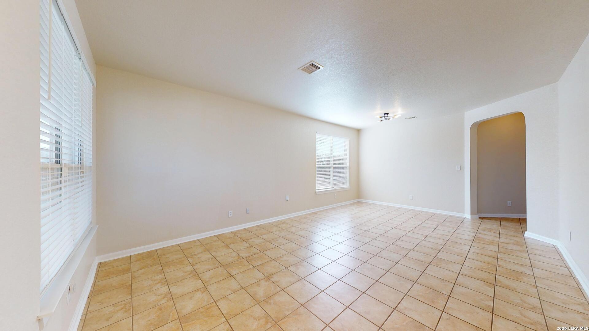 101 Springtree Cliff Cibolo, TX 78108 - Photo 4 of 46 a view of an empty room and window