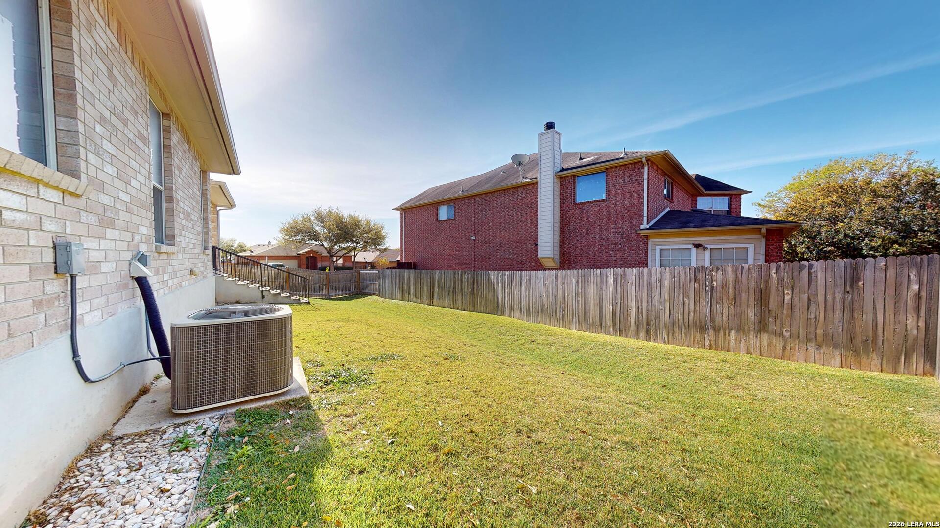 101 Springtree Cliff Cibolo, TX 78108 - Photo 46 of 46 a house view with a backyard space