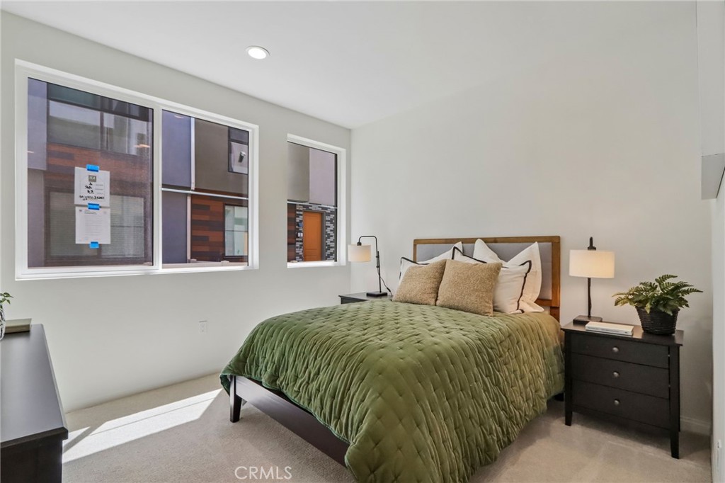 5868 Linden, Unit 6 Long Beach, CA 90805 - Photo 13 of 34 a bedroom with a bed and window