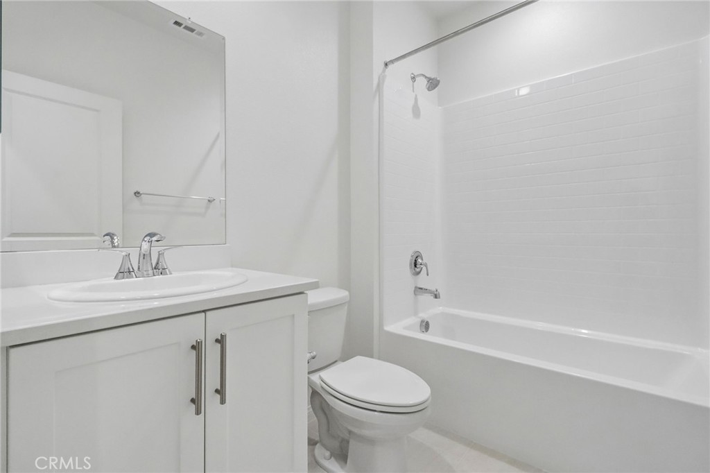 5868 Linden, Unit 6 Long Beach, CA 90805 - Photo 19 of 34 a bathroom with a sink toilet and shower