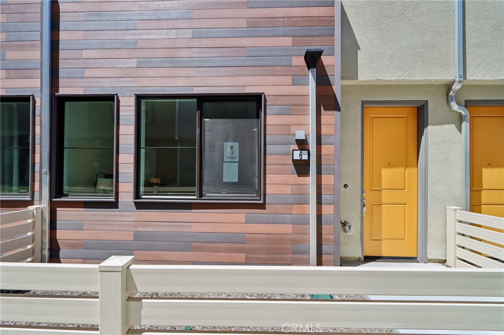 5868 Linden, Unit 6 Long Beach, CA 90805 - Photo 28 of 34 a view of a brick house with windows