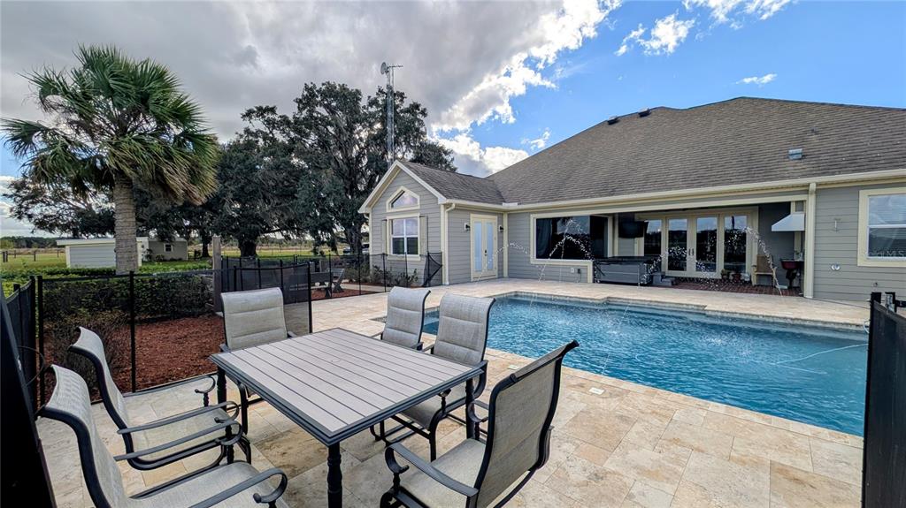 7053 George Marsh Road Zolfo Springs, FL 33890 - Photo 17 of 84 a view of a house with backyard and sitting area