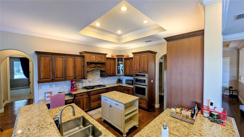 7053 George Marsh Road Zolfo Springs, FL 33890 - Photo 41 of 84 a bedroom with furniture and a flat screen tv