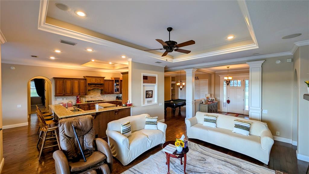 7053 George Marsh Road Zolfo Springs, FL 33890 - Photo 45 of 84 a living room with furniture and a flat screen tv