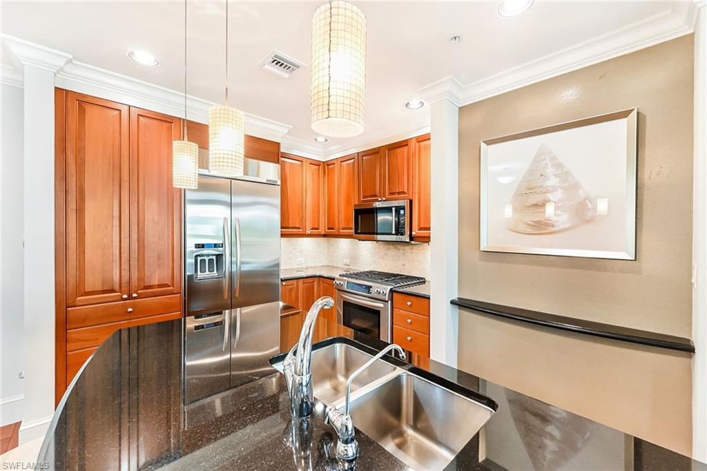 9115 Strada Place, Unit 5201 Naples, FL 34108 - Photo 7 of 22 a view of a room with workspace and windows