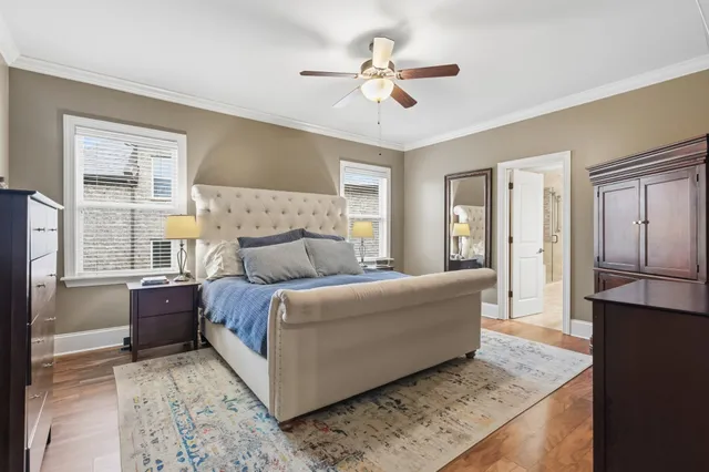 a living room with a bed furniture and a window