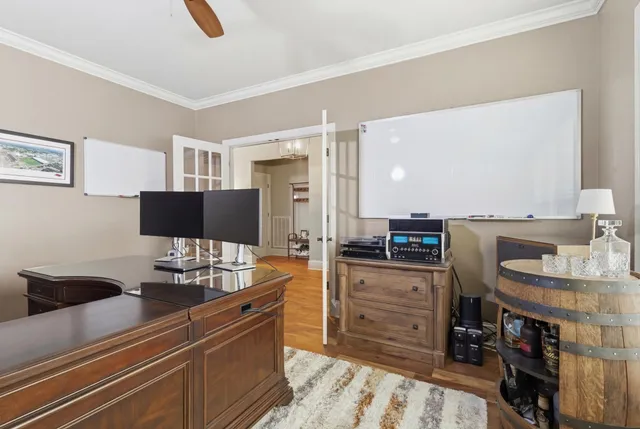 a kitchen with stainless steel appliances kitchen island granite countertop a sink and cabinets
