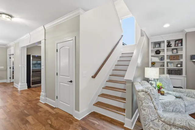 a view of entryway with workspace and stairs