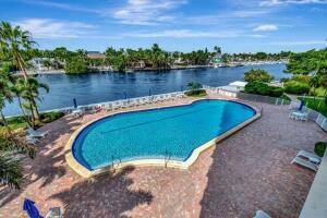 200 Mac Farlane Drive, Unit N203 Delray Beach, FL 33483 - Photo 23 of 47 an aerial view of a house with a lake view