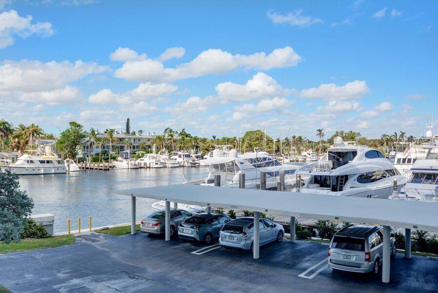 200 Mac Farlane Drive, Unit N203 Delray Beach, FL 33483 - Photo 4 of 47 a view of a terrace with sitting area