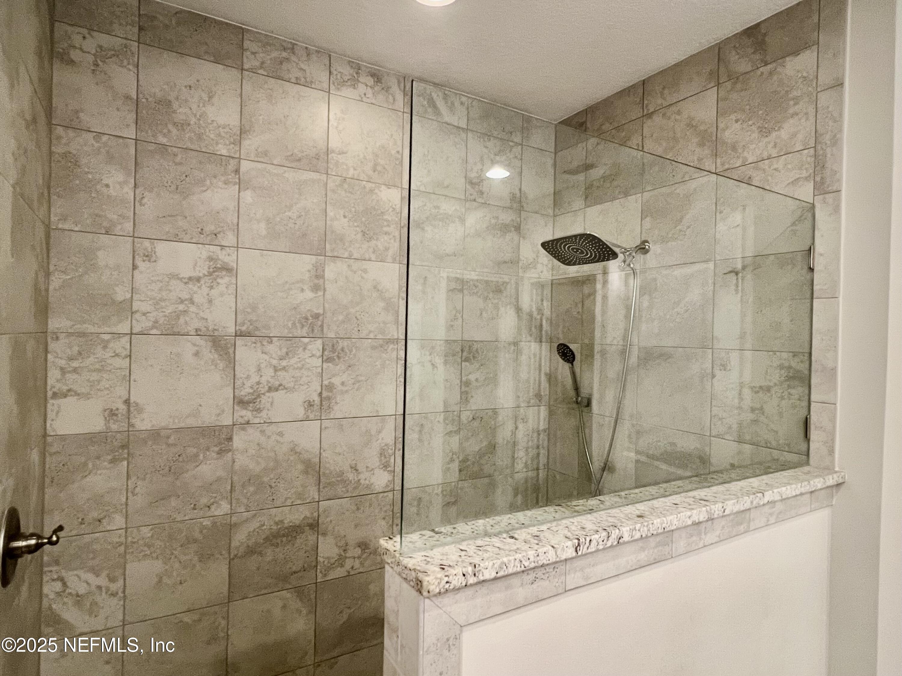 85806 Black Tern Drive Yulee, FL 32097 - Photo 21 of 38 a bathroom with a shower