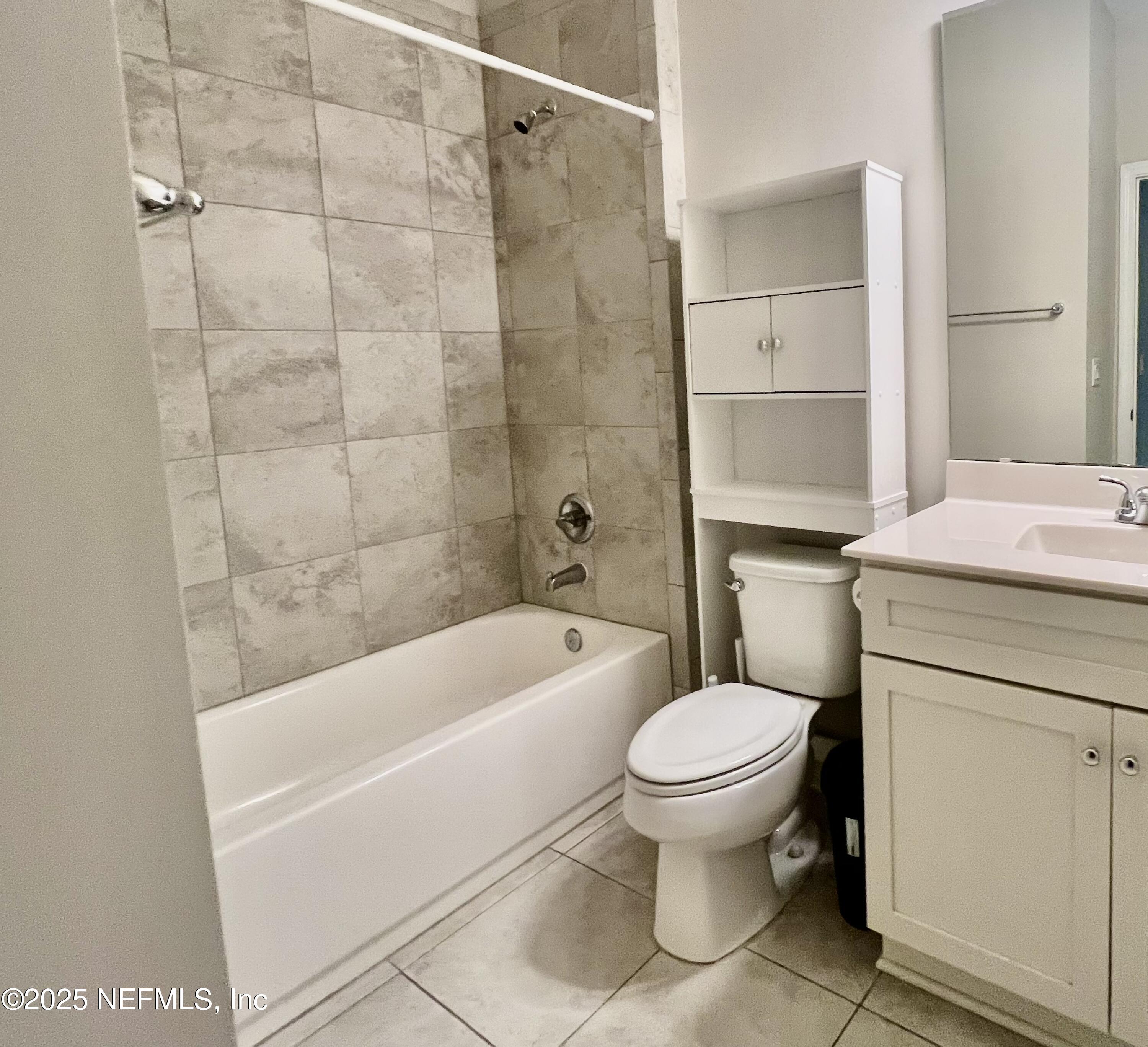 85806 Black Tern Drive Yulee, FL 32097 - Photo 24 of 38 a bathroom with a sink a toilet and a bathtub
