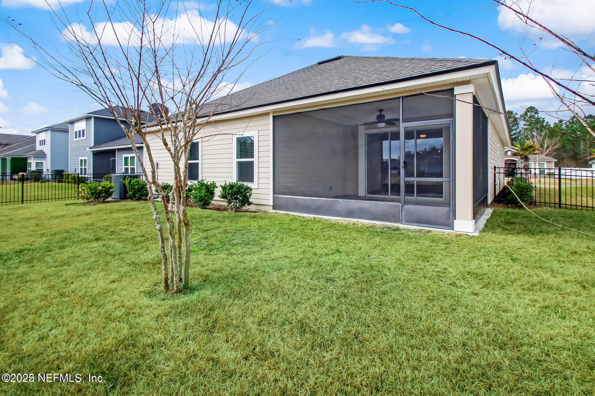 85806 Black Tern Drive Yulee, FL 32097 - Photo 27 of 38 a view of a house with a yard