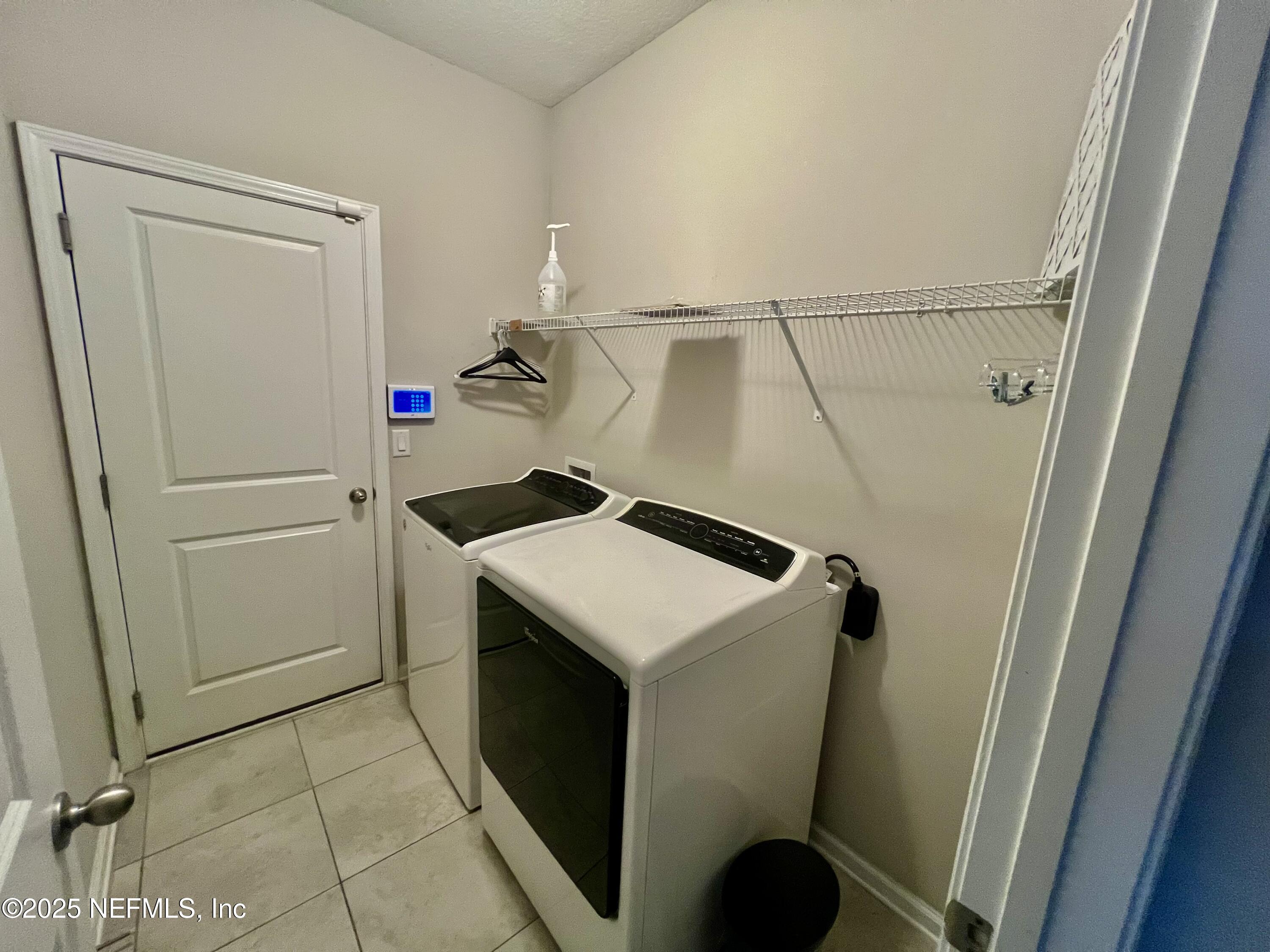 85806 Black Tern Drive Yulee, FL 32097 - Photo 29 of 38 a utility room with dryer and washer