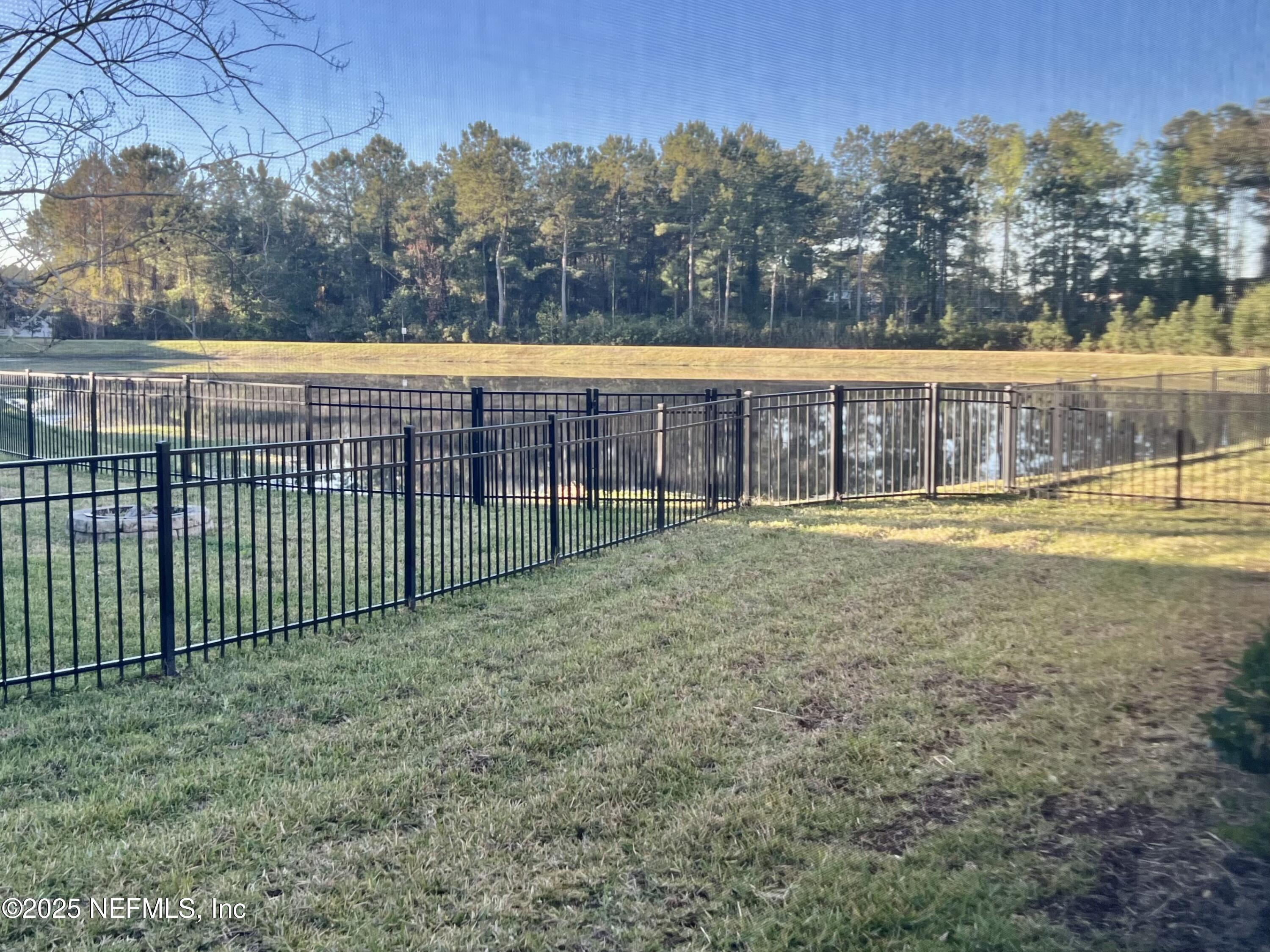 85806 Black Tern Drive Yulee, FL 32097 - Photo 30 of 38 a view of a yard with an outdoor space and seating area