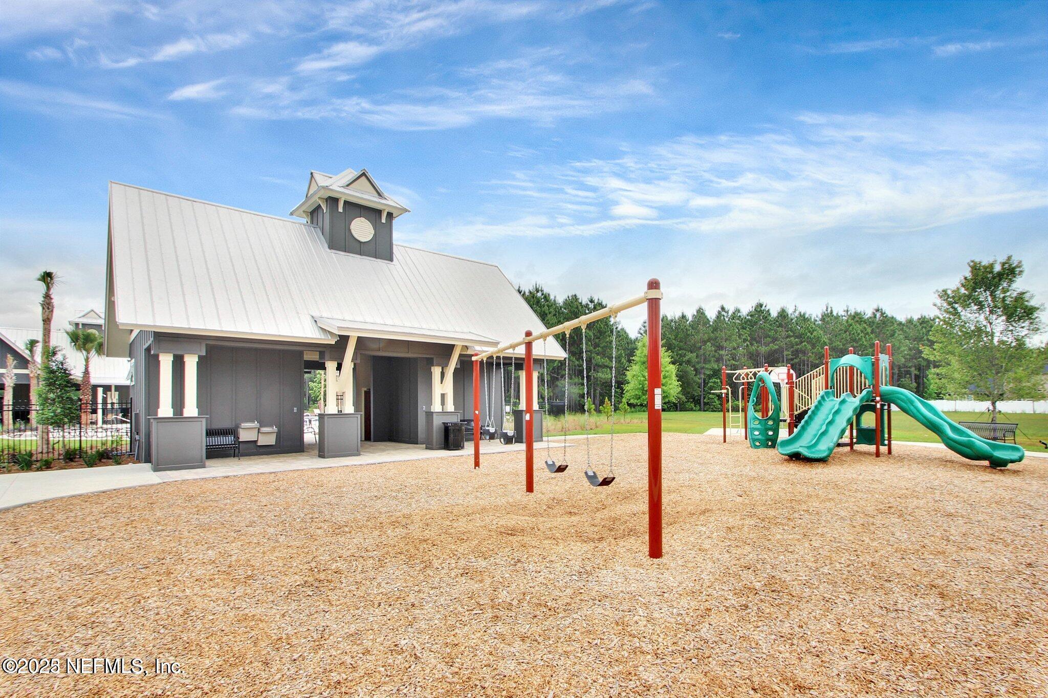 85806 Black Tern Drive Yulee, FL 32097 - Photo 35 of 38 a view of a park with swings
