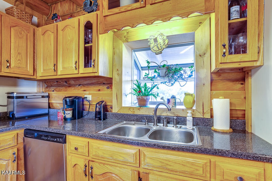 2030 Holston River Drive Rutledge, TN 37861 - Photo 16 of 53 a kitchen with granite countertop a sink and a window