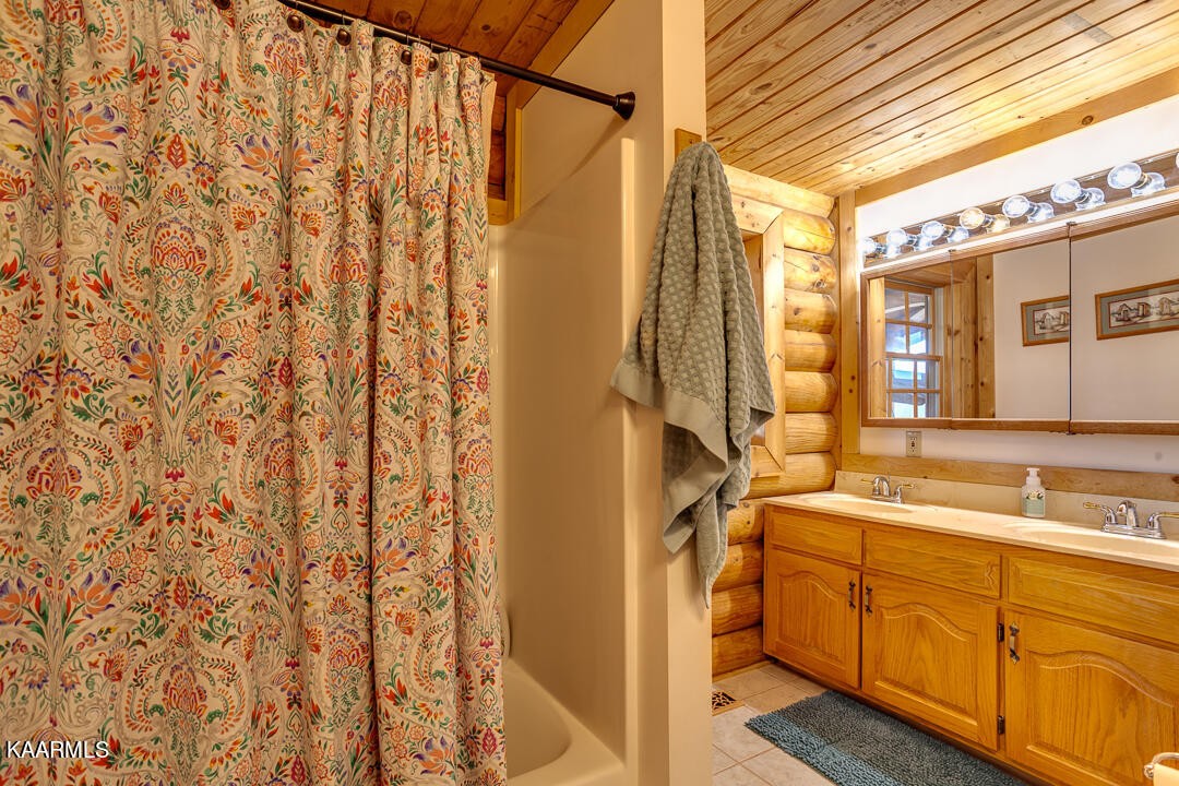 2030 Holston River Drive Rutledge, TN 37861 - Photo 21 of 53 a bathroom with a sink and a mirror