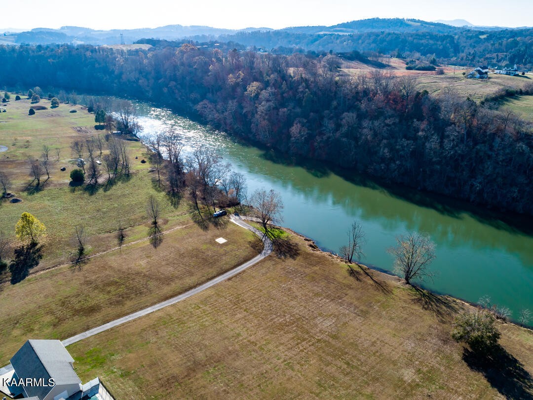 2030 Holston River Drive Rutledge, TN 37861 - Photo 50 of 53 a view of a backyard with a barn