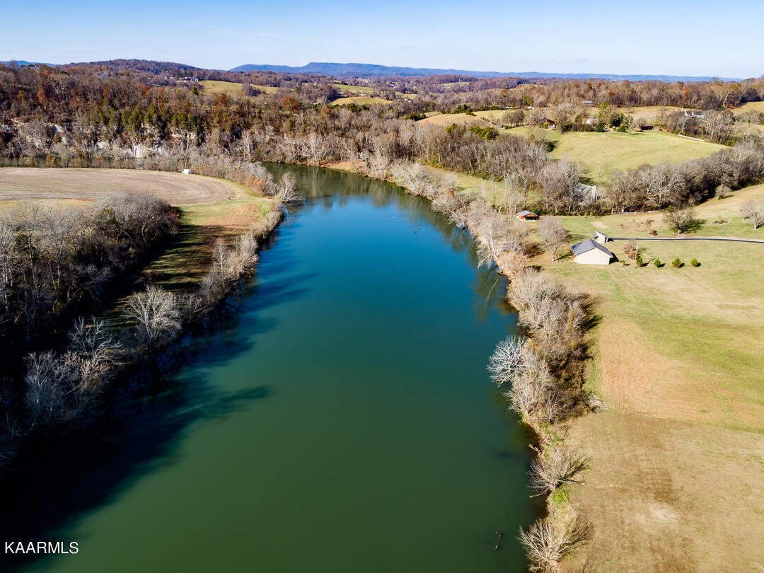 2030 Holston River Drive Rutledge, TN 37861 - Photo 52 of 53 a view of a lake with a mountain