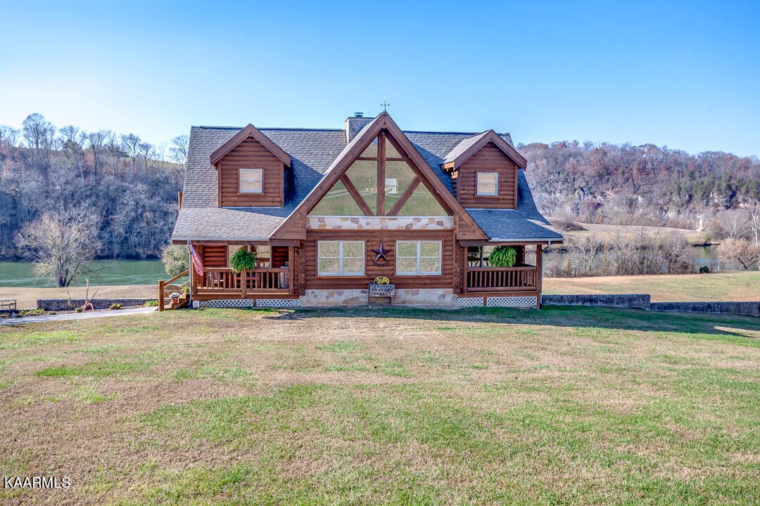 2030 Holston River Drive Rutledge, TN 37861 - Photo 53 of 53 a view of a house with pool and a yard