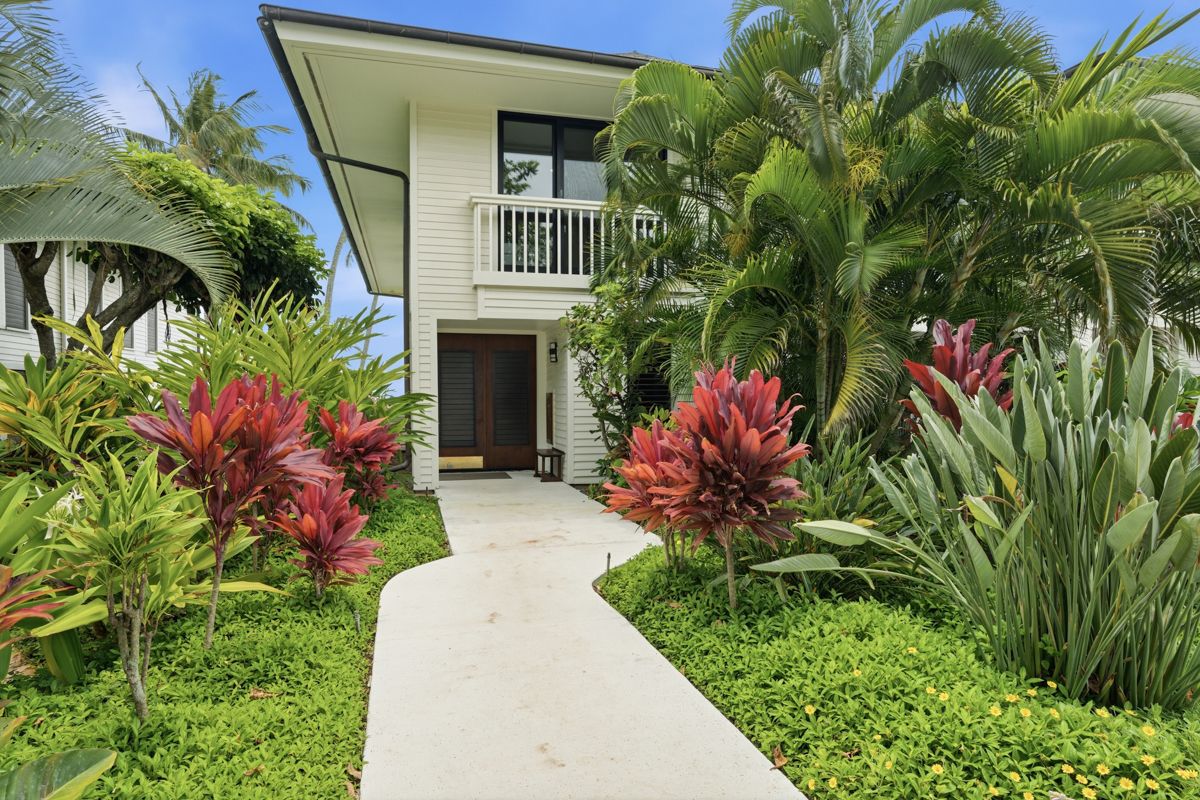 2221 Kapili Road, Unit 6 Koloa, HI 96756 - Photo 20 of 27 a front view of a house with a yard