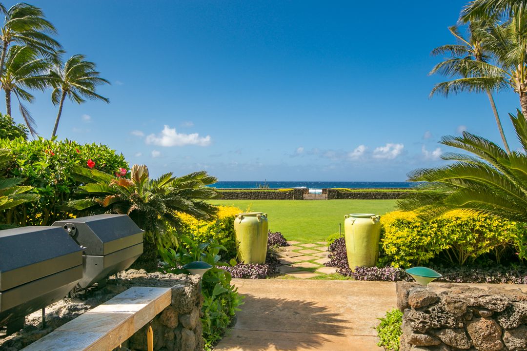 2221 Kapili Road, Unit 6 Koloa, HI 96756 - Photo 24 of 27 a view of a yard with a patio