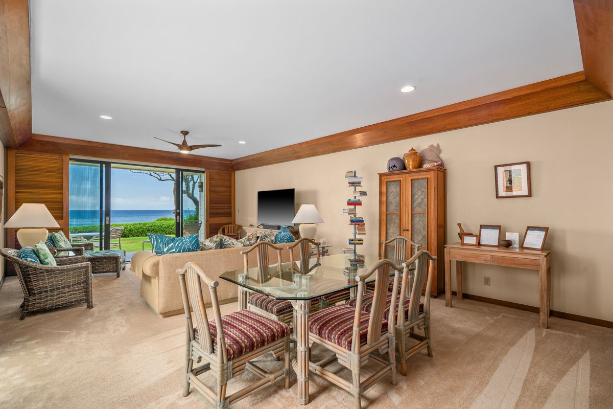 2221 Kapili Road, Unit 6 Koloa, HI 96756 - Photo 5 of 27 a view of a dining room with furniture window and outside view
