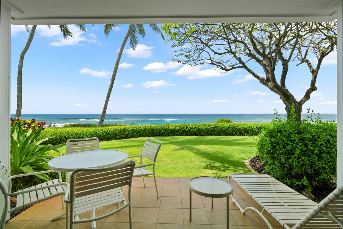 2221 Kapili Road, Unit 6 Koloa, HI 96756 - Photo 7 of 27 a view of a chairs and table in patio