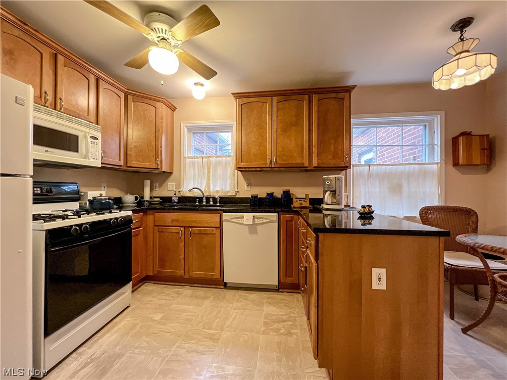 2610 Edgehill Road Cleveland, OH 44106 - Photo 8 of 28 Kitchen with built-in cabinet with appliances
