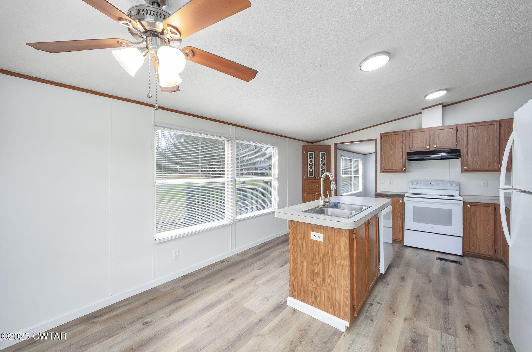 841 Turner Road Martin, TN 38237 - Photo 15 of 32 a kitchen with stainless steel appliances granite countertop a stove oven and a refrigerator