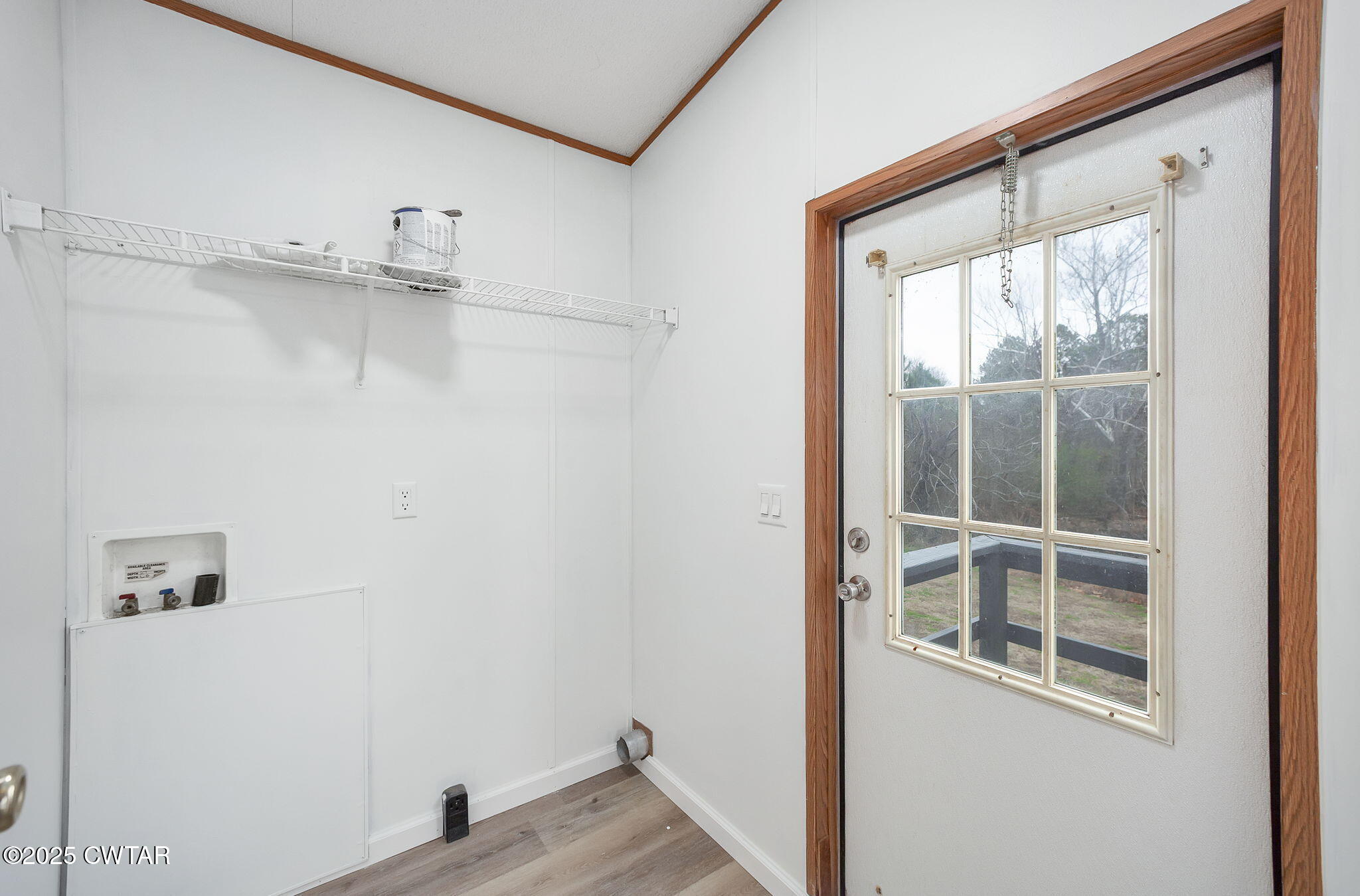 841 Turner Road Martin, TN 38237 - Photo 16 of 32 a view of a closet area with wooden floor