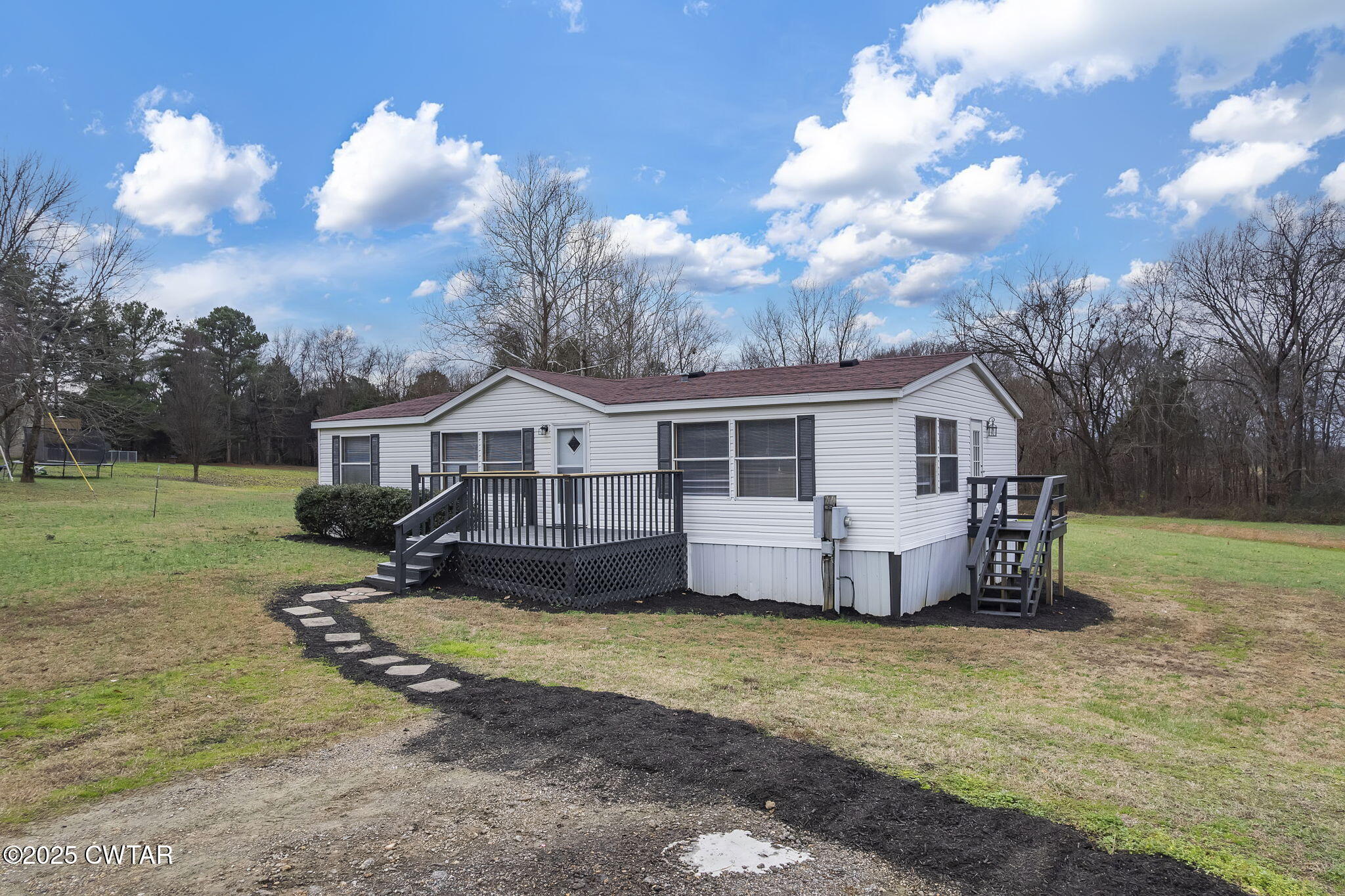 841 Turner Road Martin, TN 38237 - Photo 17 of 32 a view of a house with a yard