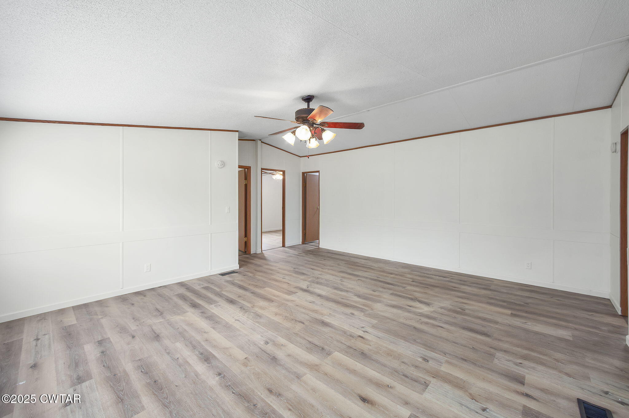 841 Turner Road Martin, TN 38237 - Photo 10 of 32 a view of an empty room with wooden floor