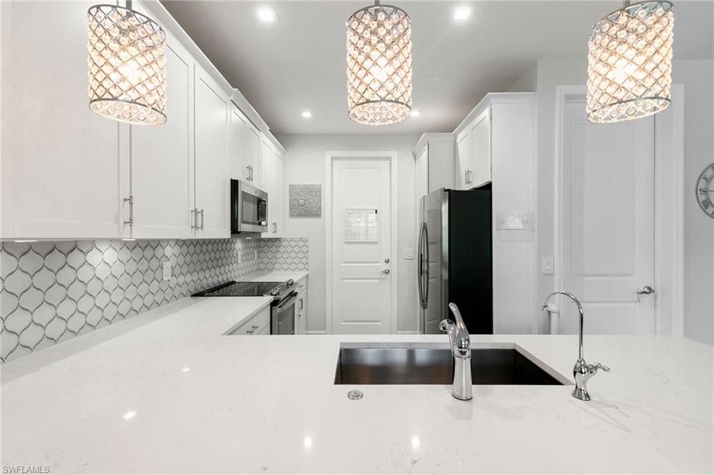 7619 Morgan Way Naples, FL 34119 - Photo 11 of 40