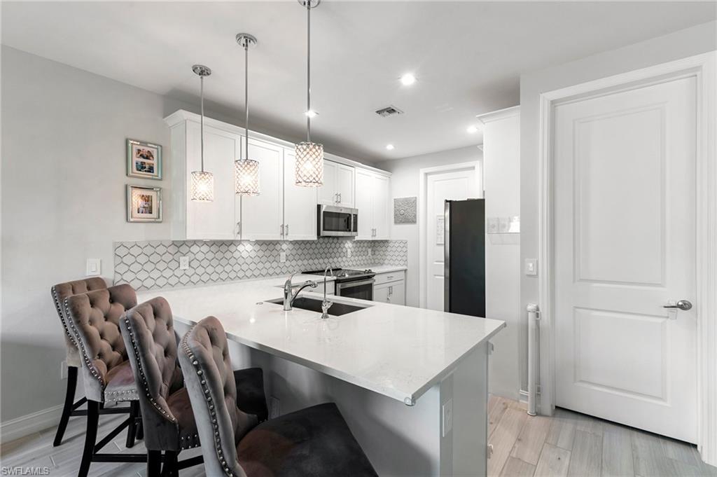 7619 Morgan Way Naples, FL 34119 - Photo 10 of 40