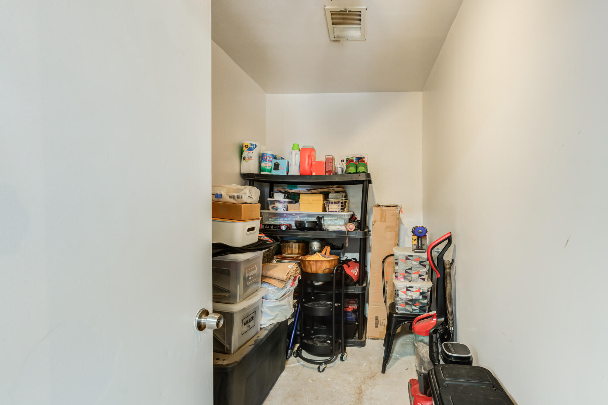 2019 40th Street Lubbock, TX 79412 - Photo 29 of 33 a view of storage and utility room with racks on the wall