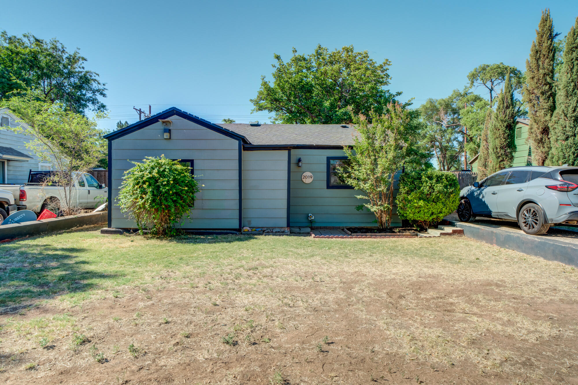 2019 40th Street Lubbock, TX 79412 - Photo 7 of 33 a house with a yard