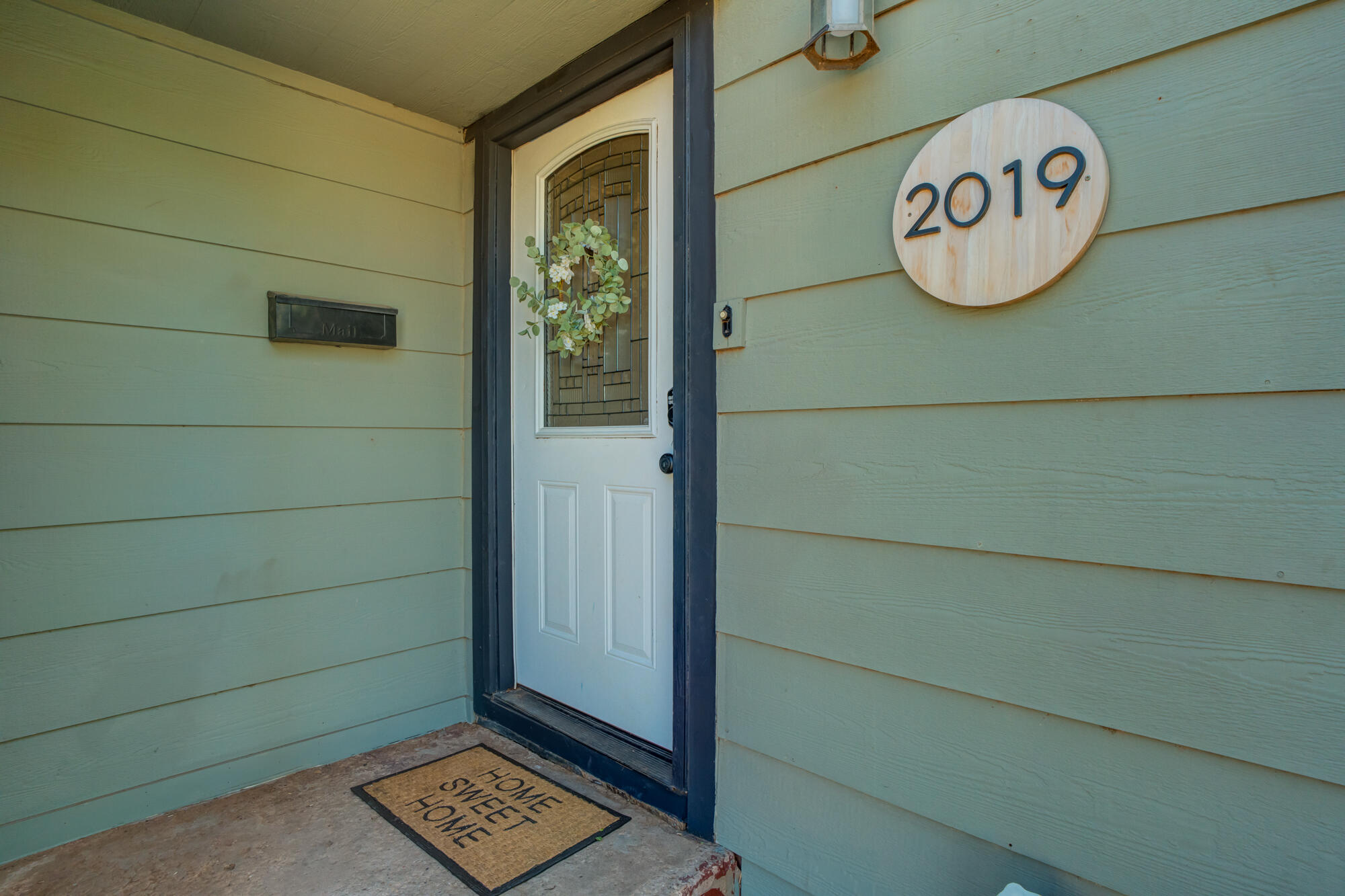 2019 40th Street Lubbock, TX 79412 - Photo 8 of 33 a view of a door and chair